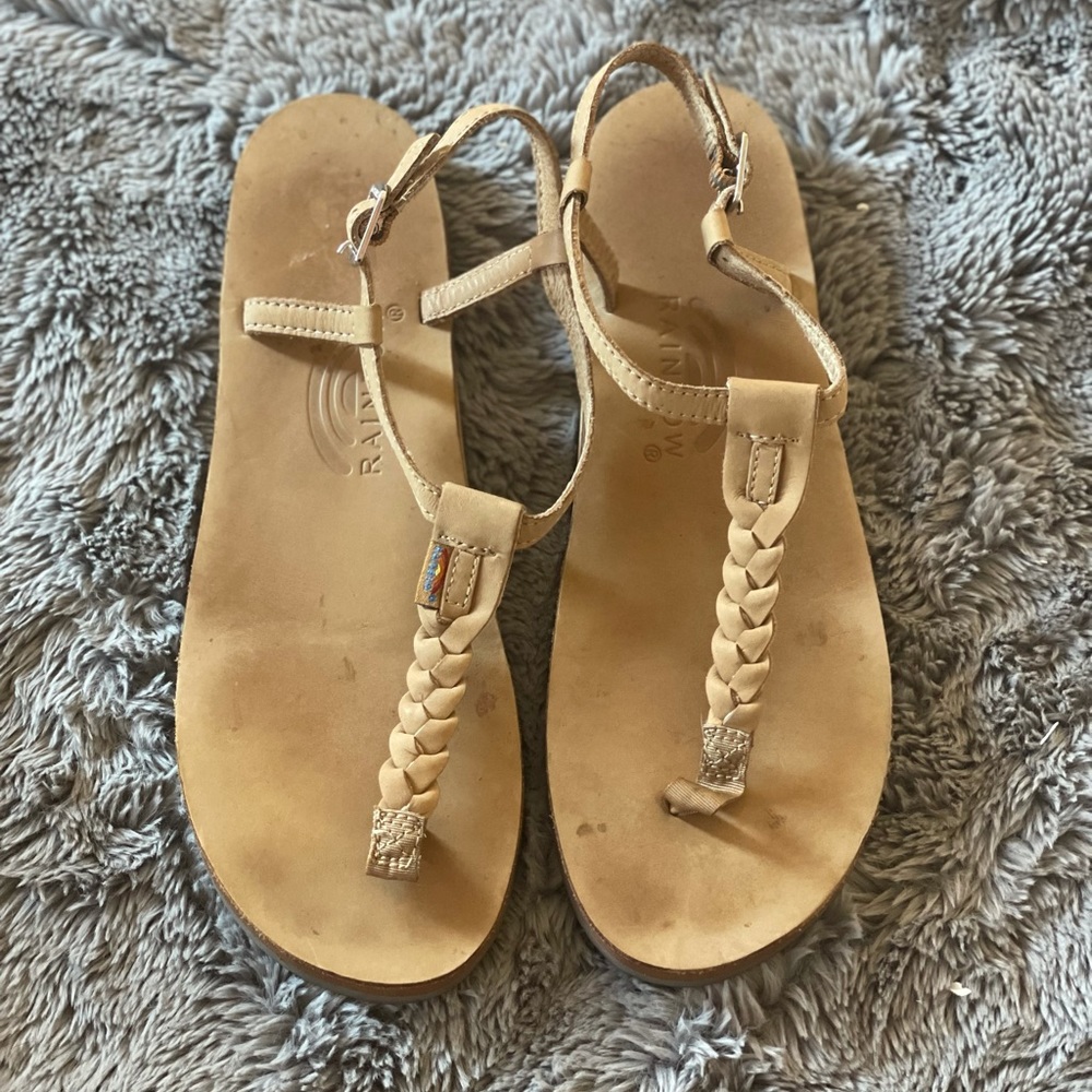 Rainbow braided leather sandals in tan/beige.